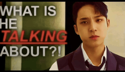 a man in a suit and tie is talking about something