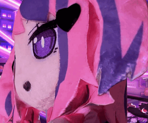 a close up of a pink and purple anime character with a purple eye