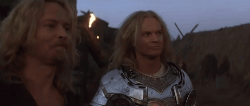 two men in armor standing next to each other with the words let 's go little brother