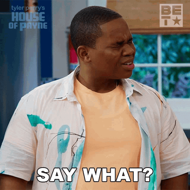a man in a white shirt says " say what "