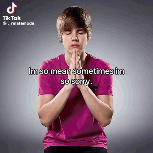 a young man in a pink shirt is praying with the words im so mean sometimes im so sorry above him