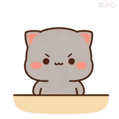 Goma, a gray cartoon cat, sits sulking at a table.
