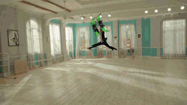 the word rogue is on the floor in a dance studio