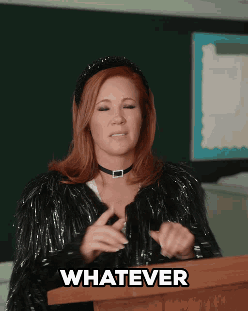 Woman gestures firmly with a “WHATEVER” caption.