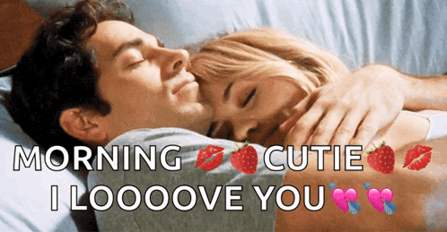 A couple cuddles in bed with “MORNING CUTIE I LOOOVE YOU” text.