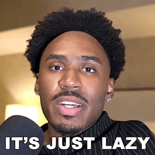 a man says it 's just lazy in front of a microphone .