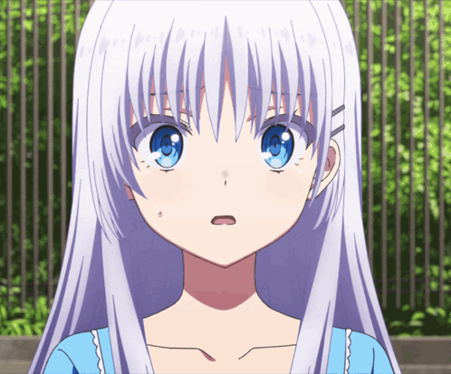 a girl with long white hair and blue eyes
