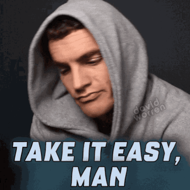 A hooded man looks down while large text says “TAKE IT EASY, MAN.”