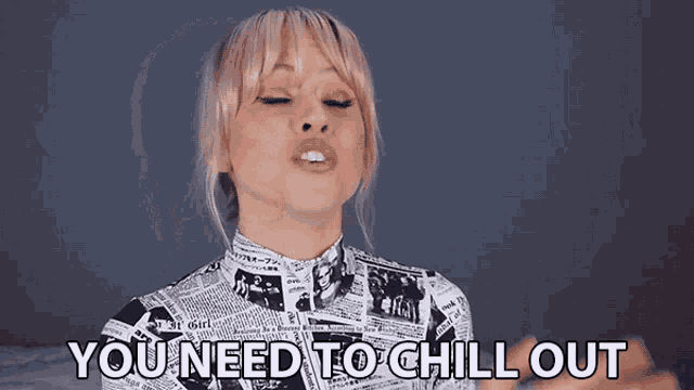 A woman exhales dramatically with the caption “YOU NEED TO CHILL OUT.”