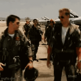 A Top Gun clip shows two men walking together, presented as a Friends mashup.