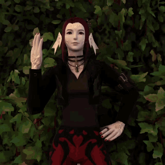 a woman in a black top and red pants is waving