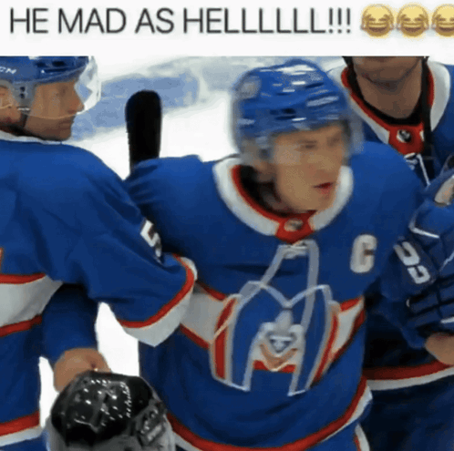 a hockey player with the number 6 on his jersey