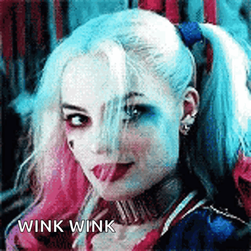 Harley Quinn smiles with “WINK WINK” text.