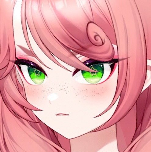 a close up of a girl 's face with green eyes