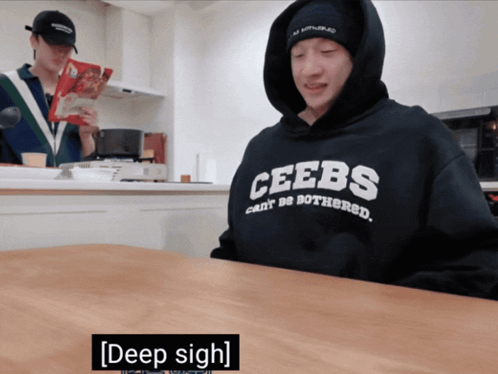a man wearing a hoodie that says ceebs on it