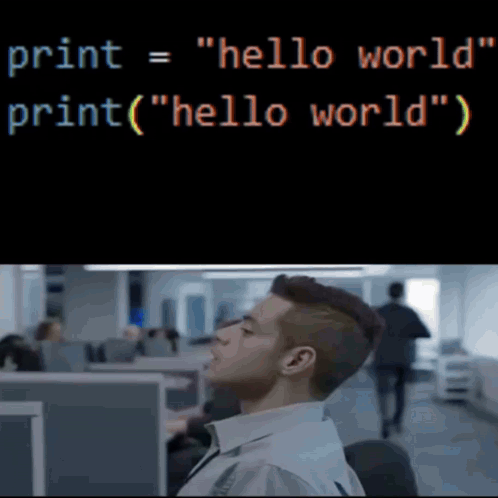 a man sits in front of a computer with the words print = " hello world " on the screen