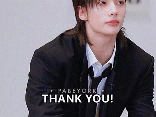 a picture of a man in a suit and tie with the words thank you below him