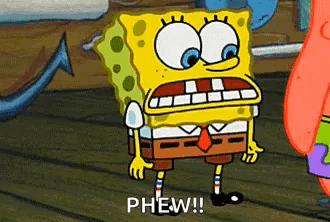 SpongeBob grimaces tensely with the caption “PHEW!!”.