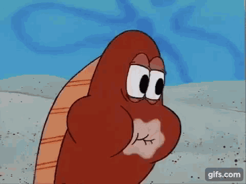 a cartoon character from spongebob squarepants is looking at the camera with a big smile on his face .