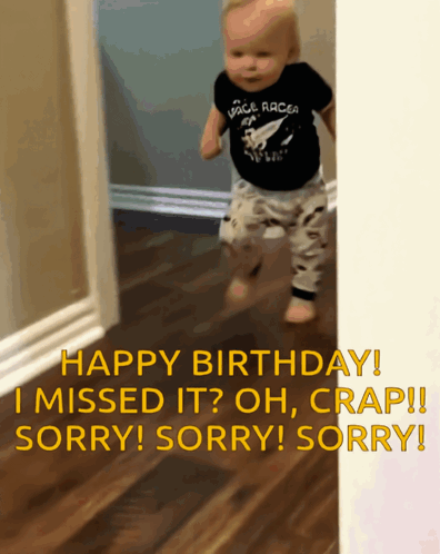 a baby wearing a shirt that says voice racer is walking down a hallway