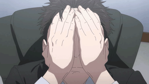 An anime character bends forward with both hands covering their face.