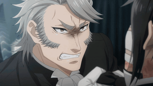 a man with gray hair and a beard is making a very angry face
