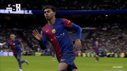 a soccer player wearing a shirt that says ' barca ' on it