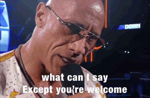 The Rock looks down in a dramatic stage shot captioned “what can I say except you’re welcome.”