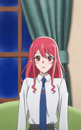 a girl with red hair is wearing a white shirt and tie