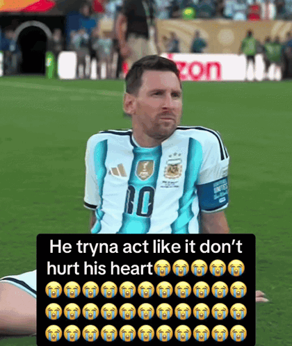 a soccer player with the number 10 on his jersey sits on the ground