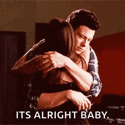 A couple embrace tightly with the caption “ITS ALRIGHT BABY.”