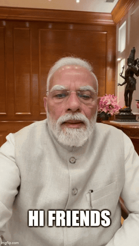 Narendra Modi faces the camera with the caption “HI FRIENDS.”