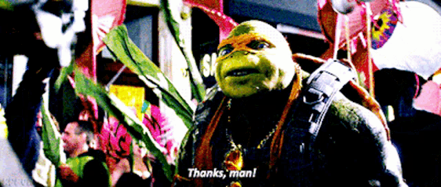 a teenage mutant ninja turtle says " thanks man " in front of a crowd