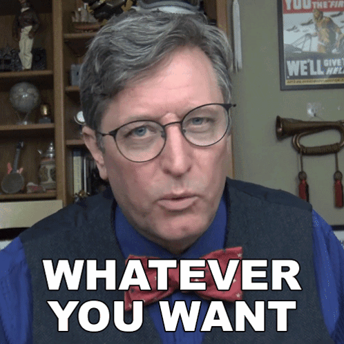 a man is wearing glasses and a bow tie and says whatever you want