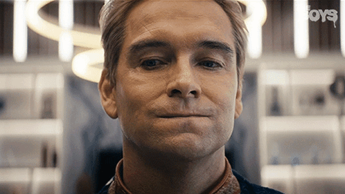 Homelander from The Boys forces a tight, angry smile.