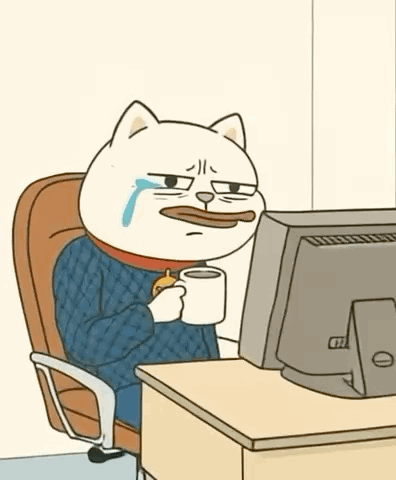 A white cartoon cat at a computer cries while holding a mug.