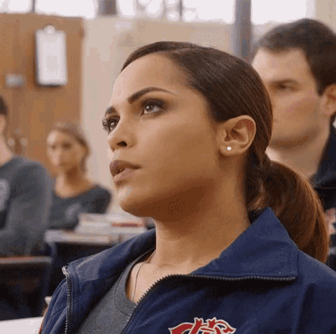 Gabriela Dawson rolls her eyes in a crowded room.