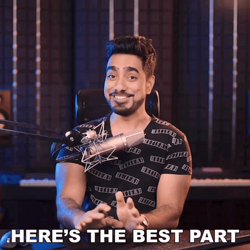 a man sitting in front of a microphone with the words here 's the best part above him