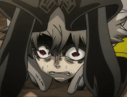 a close up of a cartoon character 's face with a shocked look on his face