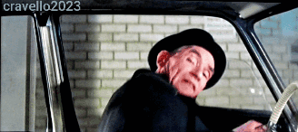 a man in a hat is sitting in a car with the name cravello2023 written on the bottom