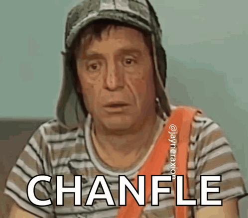 a man wearing a hat and a striped shirt with the word chanfle on his chest
