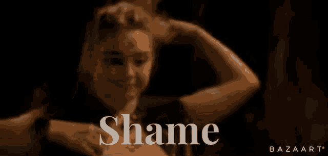 a blurry picture of a woman with the word shame behind her