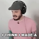 a man wearing headphones and a hat is saying i think i made a