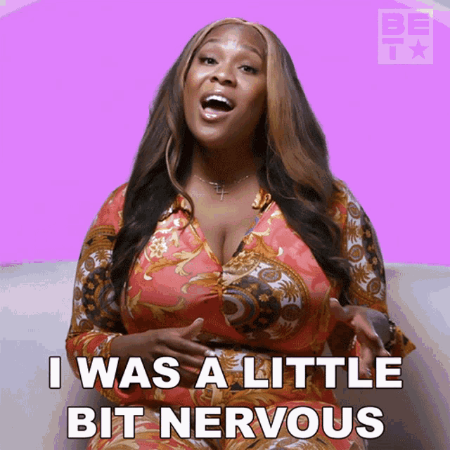 a woman says i was a little bit nervous while sitting on a couch