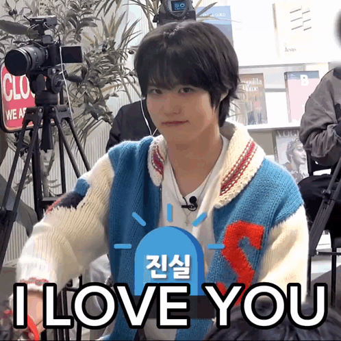 a man in a sweater says i love you