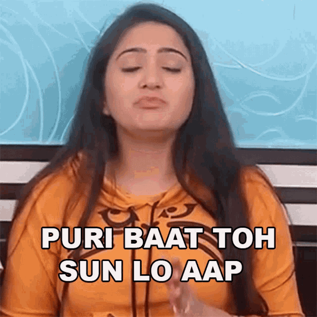 a woman with her eyes closed has the words puri baat toh sun lo aap written on her face