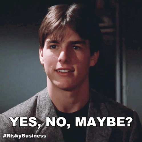 a man in a suit says yes no maybe in front of him