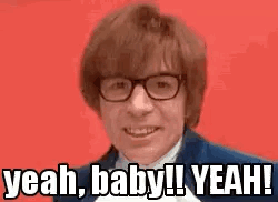 Austin Powers smiles enthusiastically on red with “yeah, baby!! YEAH!”