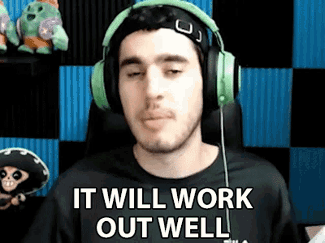a man wearing headphones is saying `` it will work out well '' while sitting in a chair .