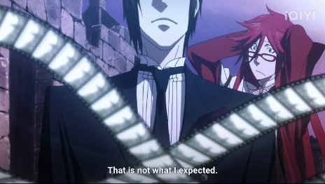 a man in a suit says that is not what i expected in front of a film strip